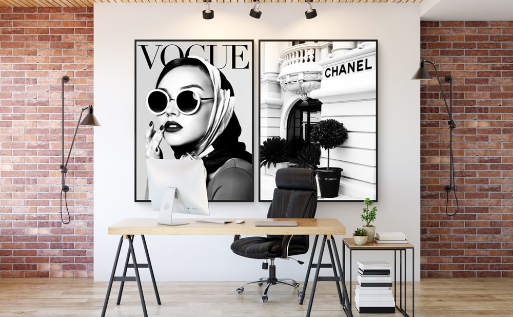 Two photos on canvas hanging in an office space